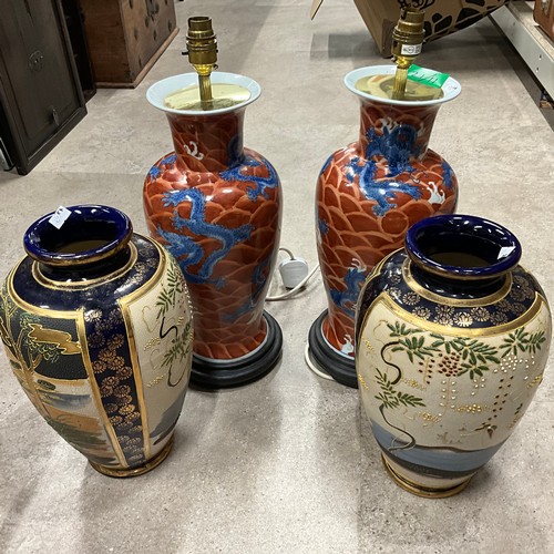 20 - A pair of oriental vases along with a pair of Chinese style lamps.Untested for electrical safety. So... 