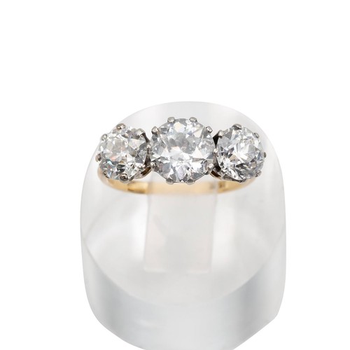 7 - 18ct gold and three-stone diamond ring, the old European cut diamonds measuring approximately 3.00 c... 
