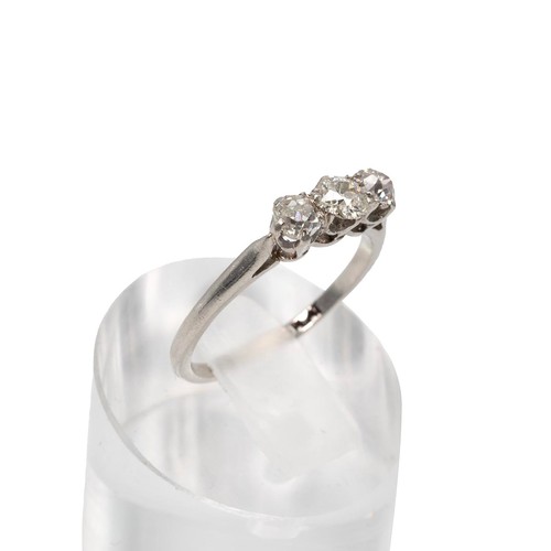 81 - A platinum set three stone diamond ring, the centre stone approx 0.15ct flanked by two further diamo... 