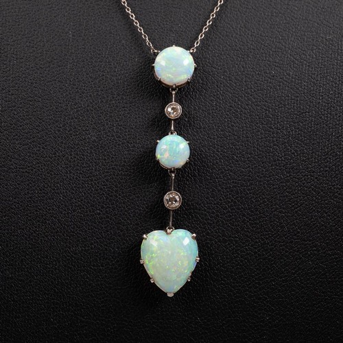 111 - Edwardian opal and diamond pendant necklace, set with two graduating opals of circular form and an o... 