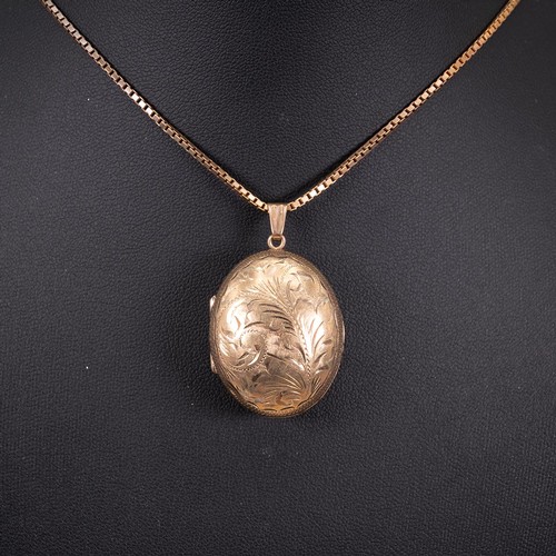 114 - 9ct gold oval ball locket with engraved decoration and box link necklace with spring ring clasp, dro... 
