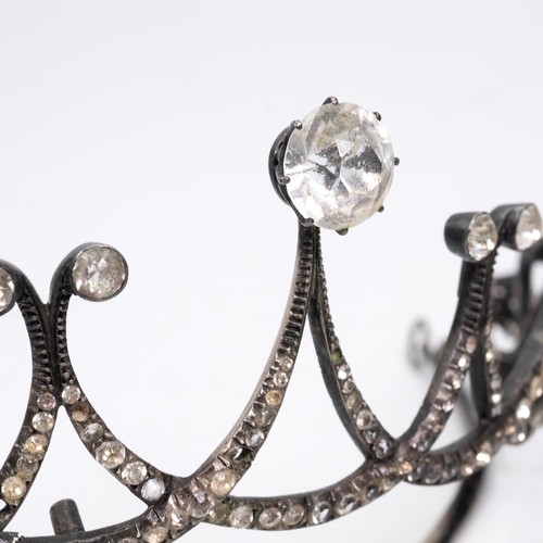 162 - A 19th Century silver and paste tiara, of graduated interwoven scroll design, the tops set with larg... 