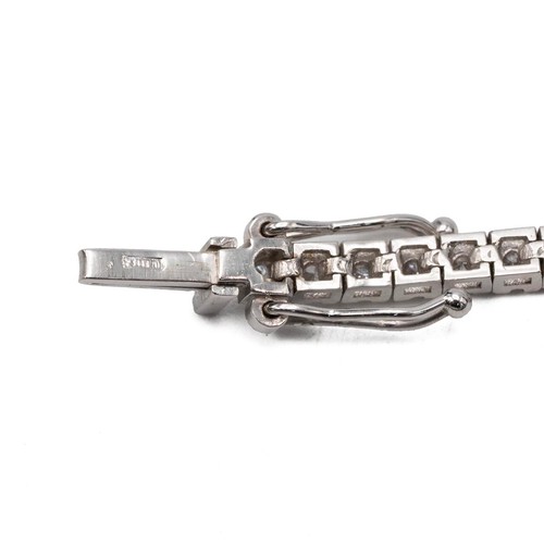 154 - 14ct white gold (tested) diamond tennis bracelet set with brilliant-cut diamonds and a push-pull cla... 