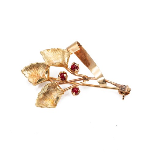 168 - 18ct gold hallmarked  leaf brooch set with three cabochon, weight 4.6 grams.