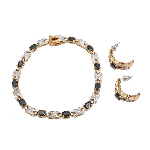 222 - A 14ct two-tone gold-plated sapphire bracelet, L19.5cm, and an earring set, in original box.