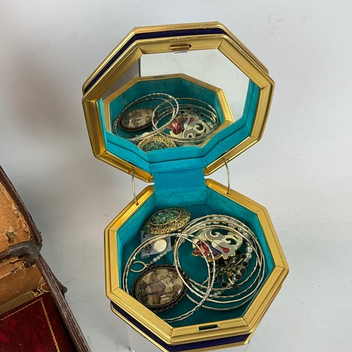 244 - A large collection of costume jewellery, including amethyst necklace, cufflinks, pendants, brooches,... 