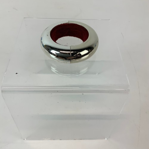 253 - An assortment of Newbridge metalware including napkin rings, boxed pen and costume jewellery etc.