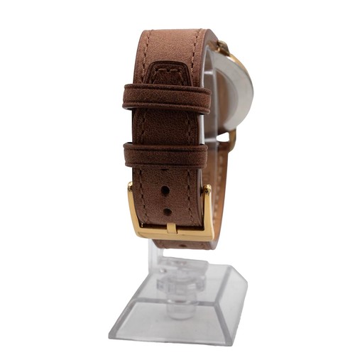 316 - A Gentlemen's Movado wristwatch with a cream textured dial marked Movado, with mixed Arabic numeral ... 