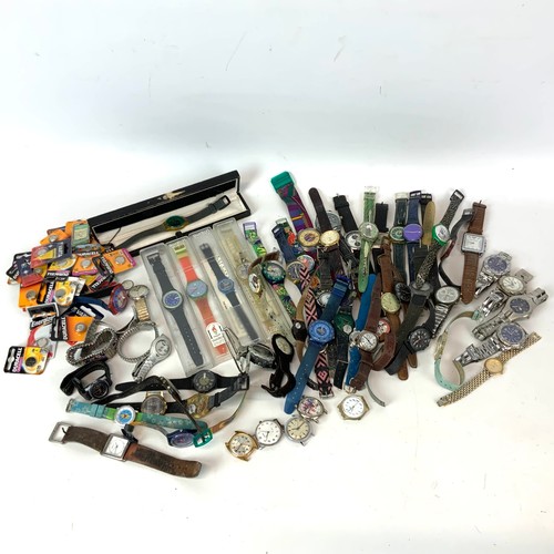 326 - A collection of Swatch watches, along with various others and watch batteries