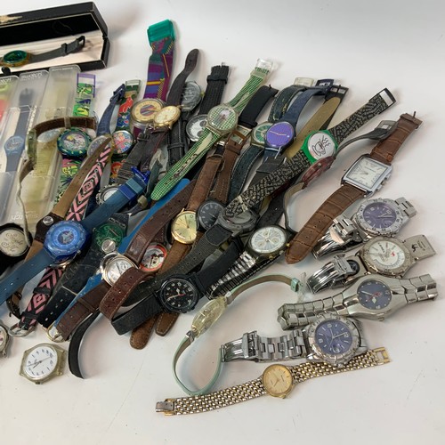 326 - A collection of Swatch watches, along with various others and watch batteries