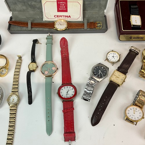 328 - A large collection of fashion watches and costume watches, including Rip Curl, Rotary, Accurist, Cit... 
