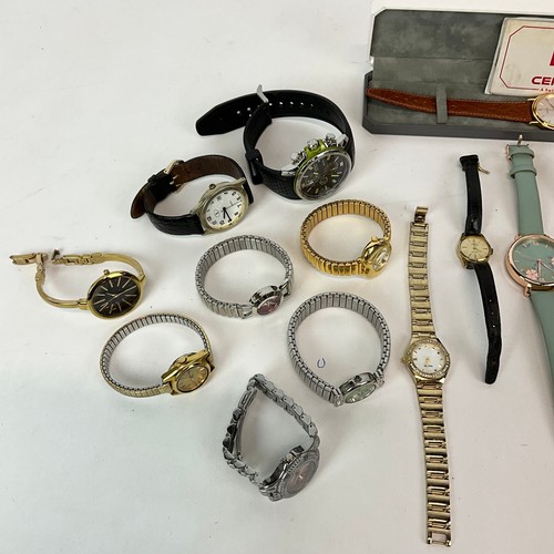 328 - A large collection of fashion watches and costume watches, including Rip Curl, Rotary, Accurist, Cit... 