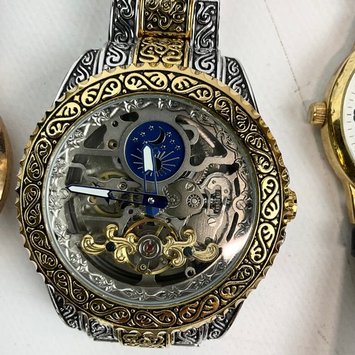 328 - A large collection of fashion watches and costume watches, including Rip Curl, Rotary, Accurist, Cit... 