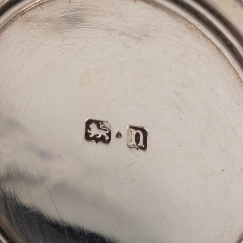 407 - A desk set in a leather box comprising an inkwell, hallmarked Birmingham 1912, complerte with tolled... 