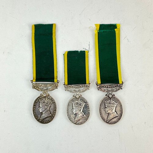 566 - Three George VI Territorial Efficiency Service Medals awarded to 3387161 G.N.R. G. Etherington, Roya... 