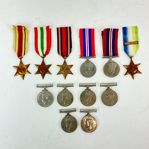 606 - A collection of WWII medals to include six 1939-1945 War Medals, two defence medals, the Italy Star,... 
