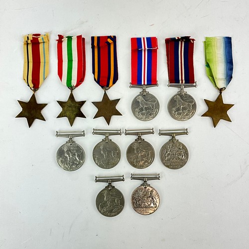 606 - A collection of WWII medals to include six 1939-1945 War Medals, two defence medals, the Italy Star,... 