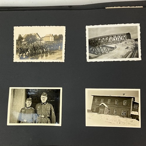 615 - A collection of black-and-white photographs of WWII German barrack life and the European invasion, m... 