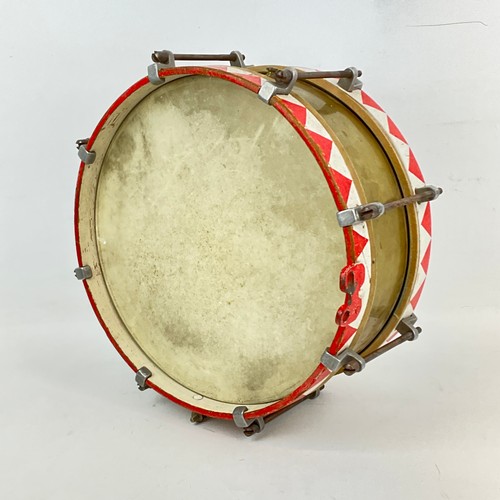 617 - A WWII Hitler Youth marching drum, with brass tension rods, attached a red and white decorated count... 