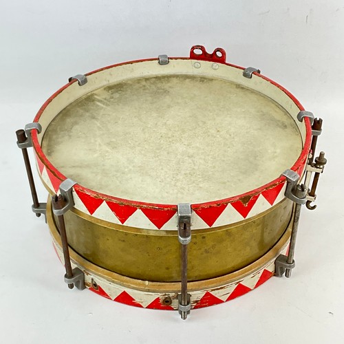 617 - A WWII Hitler Youth marching drum, with brass tension rods, attached a red and white decorated count... 