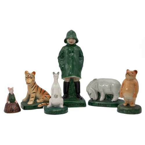 634 - A scarce full set of 1936 Winnie the Pooh figures by Fulham Potteries, one of six sets believed to h... 