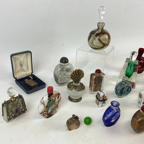663 - Collection of Chinese scent bottles, including reverse glass-painted examples, a cranberry glass vas... 