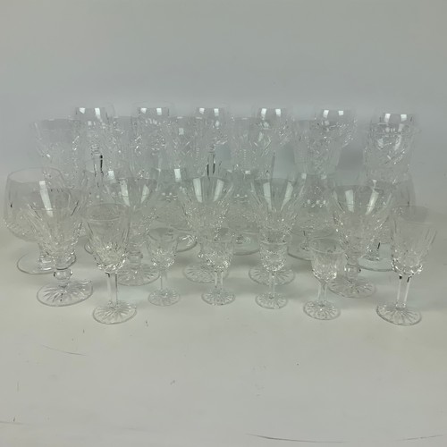 664 - A collection of 29 Waterford crystal glasses, to include tumblers, sherry glasses, wine glasses and ... 