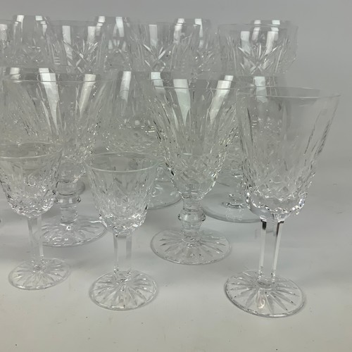 664 - A collection of 29 Waterford crystal glasses, to include tumblers, sherry glasses, wine glasses and ... 