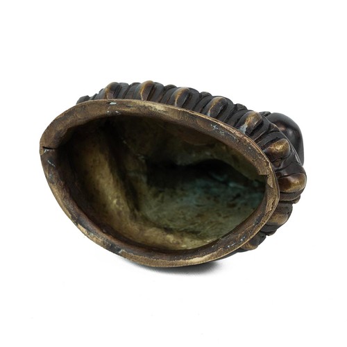 684 - A Tibetan bronze Buddha seated in meditation pose on a lotus throne base, H 20cm.