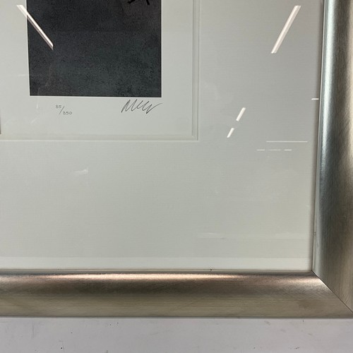 718 - Mackenzie Thorpe limited edition black and white print, 'Walking Up the Hill' No85/850, signed lower... 