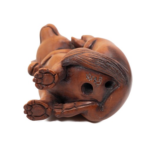 734 - A collection of nineteen netsuke, of varying styles, including boxwood examples.