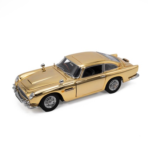 777 - Danbury Mint, a gold special edition James Bond Aston Martin DB5 007,  with a certificate of authent... 