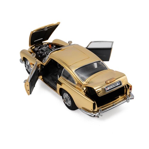 777 - Danbury Mint, a gold special edition James Bond Aston Martin DB5 007,  with a certificate of authent... 