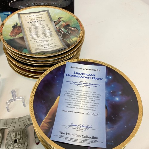 783 - A collection of Star Trek-related items, including Enterprise plates, models and other items.