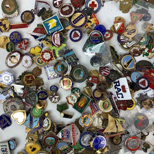 828 - A large collection of vintage enamel badges, including Butlins, advertising, motoring and others.