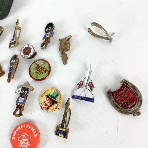 834 - Assortment of badges and brooches including early Robinsons marmalade and Scouting.