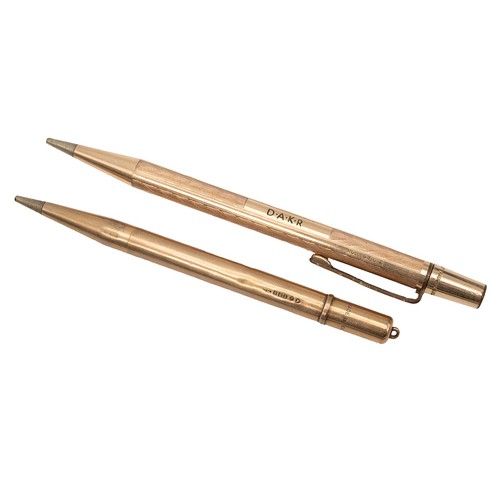 844 - A 9ct gold hallmarked propelling pencil weight 20.30 grams and one other gilt propelling pencil.