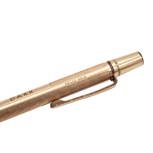 844 - A 9ct gold hallmarked propelling pencil weight 20.30 grams and one other gilt propelling pencil.