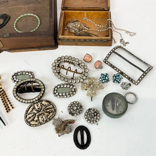 861 - An assortment of Georgian buckles, Venetian glass twist bangle, along with various costume jewellery... 