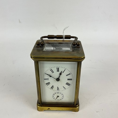 878 - Two brass cased carriage clocks one alarm example, both with white enamel dials and Roman numeral in... 