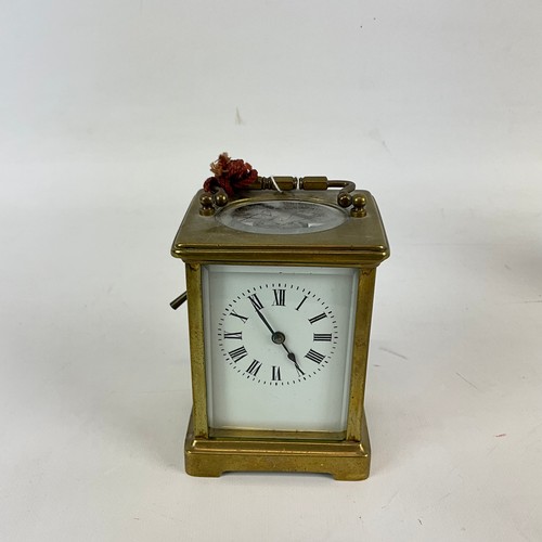 878 - Two brass cased carriage clocks one alarm example, both with white enamel dials and Roman numeral in... 