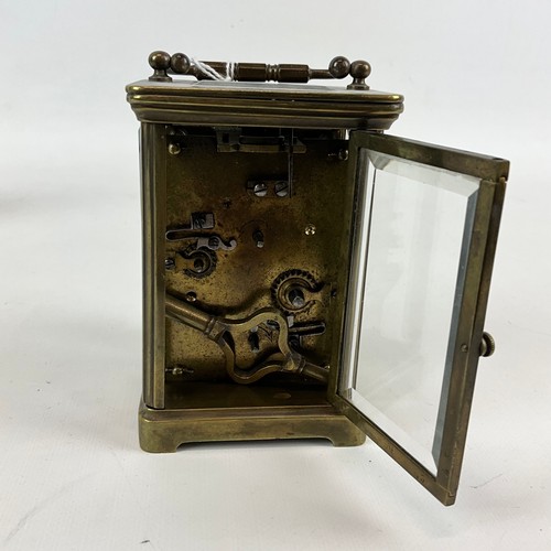878 - Two brass cased carriage clocks one alarm example, both with white enamel dials and Roman numeral in... 