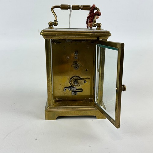 878 - Two brass cased carriage clocks one alarm example, both with white enamel dials and Roman numeral in... 
