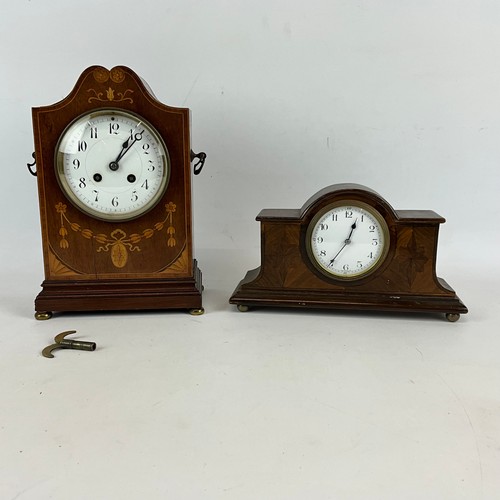 882 - Two chiming mantle clocks, an Edwardian eight day marquetry inlaid mahogany cased with white dial an... 