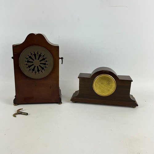 882 - Two chiming mantle clocks, an Edwardian eight day marquetry inlaid mahogany cased with white dial an... 