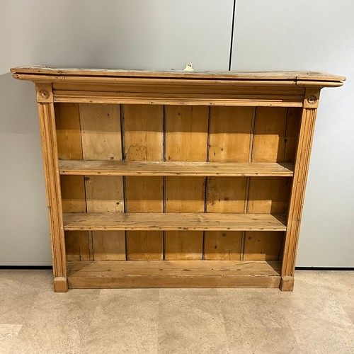897 - 19th-century pine dresser top with shaped cornice above a plank back and two open shelves, H110.5cm ... 