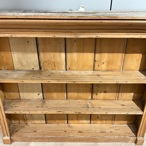 897 - 19th-century pine dresser top with shaped cornice above a plank back and two open shelves, H110.5cm ... 