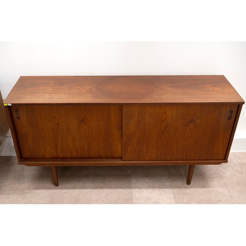 901 - A Danish design G-Plan style mid-20th-century teak sideboard with two sliding doors, enclosing two i... 