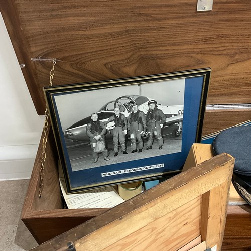 19 - A collection of militaria, to include a gas mask, canvas bags, an RAF officer's hat by Herbert Johns... 