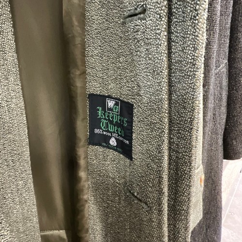 47 - A collection of men's coats, examples to include a Macintosh, Cordings of London, Burton, and a lamb... 